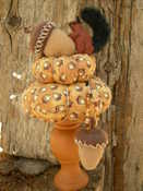SOLD:  NO glue used.  Squirrel on acorn is 10" tall base is 2 1/2" from side to side. Original Frayed Muslin.