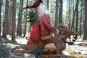 SOLD OUT:::"PATTERN" $15.00 Mailing $3.00 ~ PRE MADE $450.00 SHIPPING $9.00. ONE HALF OF $450.00 IS REQUIRED UPON ORDERING.  Santa on Reindeer stands approximately 22" tall using a 8" tall textile spool as a base.  Use what ever you want for a base as long as it gives support for this pair.  This is an Original Frayed Muslin Design with detailed instructions and two full color pictures.  Click on picture for larger view.